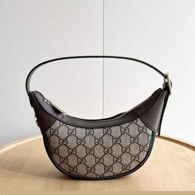 G*u*i top handle bags